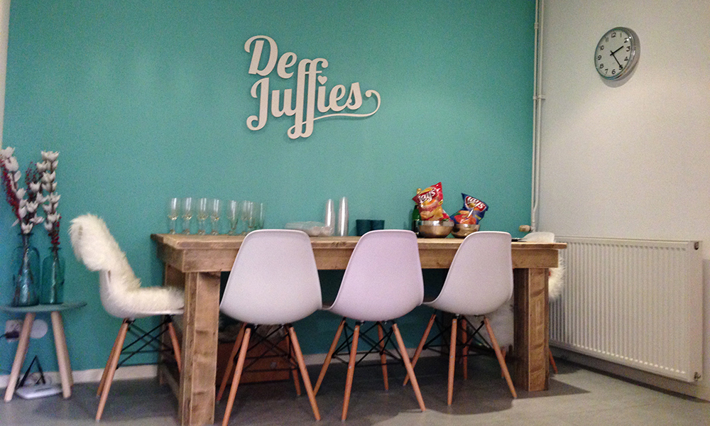 Logo aan de wand
